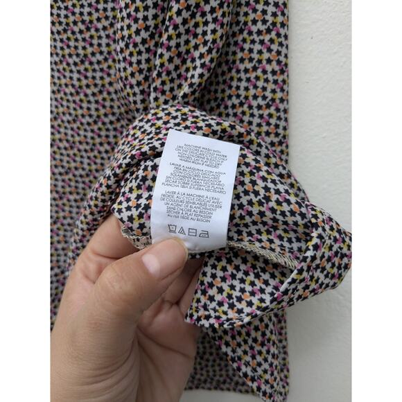 Cabi Women’s Blouse Ruffle Sleeveless Tan Black Star Print Top Size Medium - Picture 10 of 11